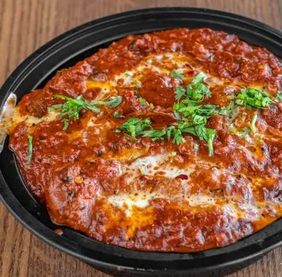 House Special pizza with generous toppings at 4 St Pizza Ltd Calgary